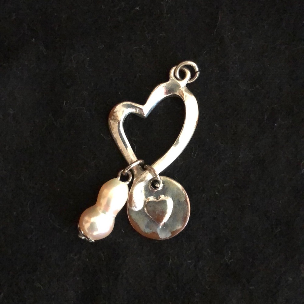 Silver and pearl heart shaped pendant